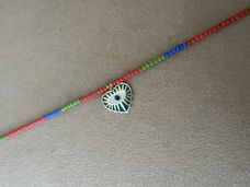 Kralen ketting met evil eye hart bedel ibiza hippie oogje
