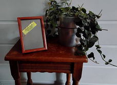 Vintage houten fotolijstje met groene achterzijde