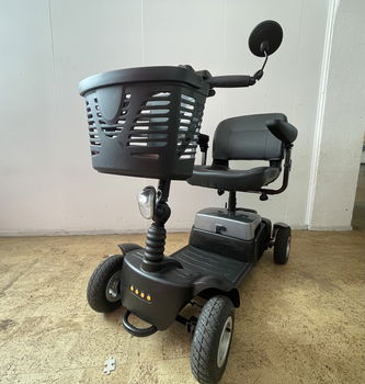 Zo goed als nieuw: Vivo scootmobiel met voor- en achterverlichting! - 0