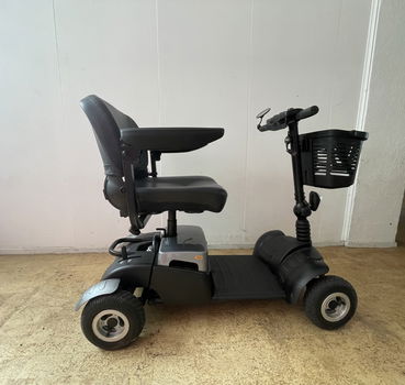 Zo goed als nieuw: Vivo scootmobiel met voor- en achterverlichting! - 1