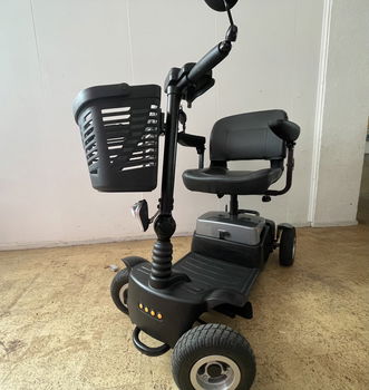 Zo goed als nieuw: Vivo scootmobiel met voor- en achterverlichting! - 3