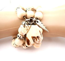 Leuke armband, drie rijen houten kralen