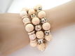 Leuke armband, drie rijen houten kralen - 2 - Thumbnail