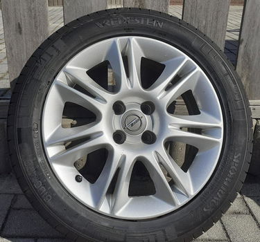 Originele lichtmetalen wielen met zomerbanden Opel Corsa 2011 - 1