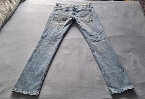Te koop gedragen blauwe spijkerbroek van CLCT (maat 34/34). - 5