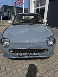 Hele leuke Nissan Figaro in Lapisgrijs met lage KM stand!