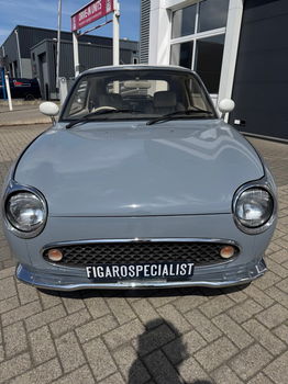 Hele leuke Nissan Figaro in Lapisgrijs met lage KM stand! - 0