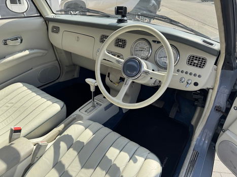 Hele leuke Nissan Figaro in Lapisgrijs met lage KM stand! - 1